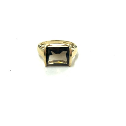 399 - Ladies 9ct gold smokey quartz dress ring, weight approximately 4.6 grams, ring size R