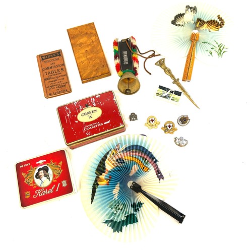 309 - Selection of collectable items includes letter openers, fans, badges, girl guide badge, good luck ba... 