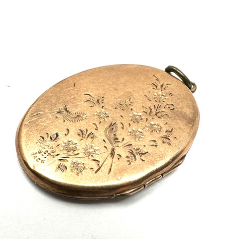 134 - 9ct gold antique etched photo locket (5.1g)