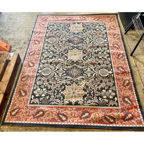 565 - Large lounge rug, approximate measurements:M92 inches by 67 inches