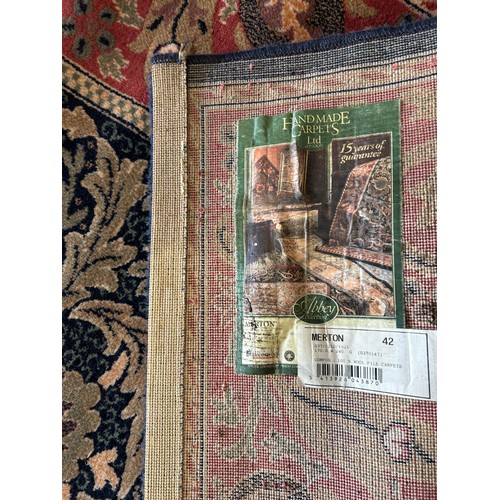 565 - Large lounge rug, approximate measurements:M92 inches by 67 inches