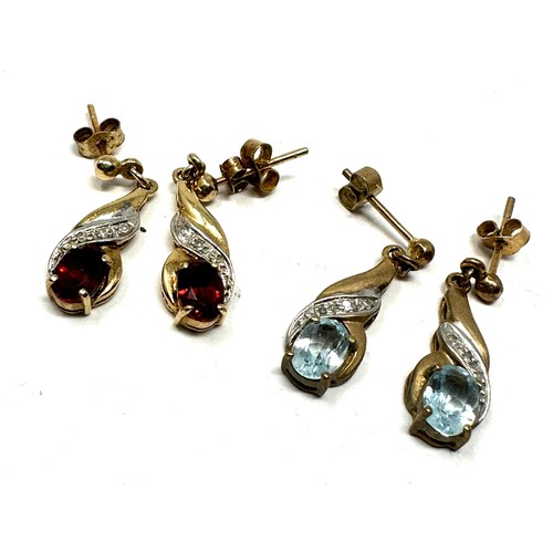 107 - 2 x 9ct yellow gold vintage paired drop earrings inc. diamond, topaz & garnet (3.5g)