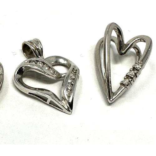 71 - 3 x 9ct gold diamond heart pendants (4.7g)