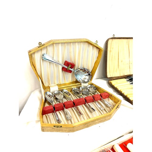 105 - 4 Vintage boxed cutlery sets