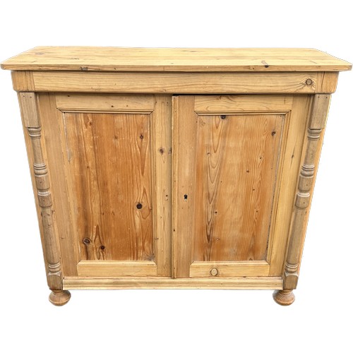 567 - Stripped pine 2 door cupboard measures approximately 37 inches tall 40 inches wide 16 inches depth