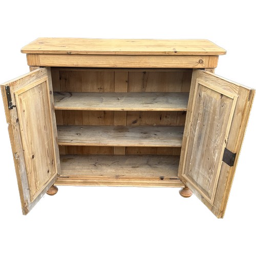 567 - Stripped pine 2 door cupboard measures approximately 37 inches tall 40 inches wide 16 inches depth