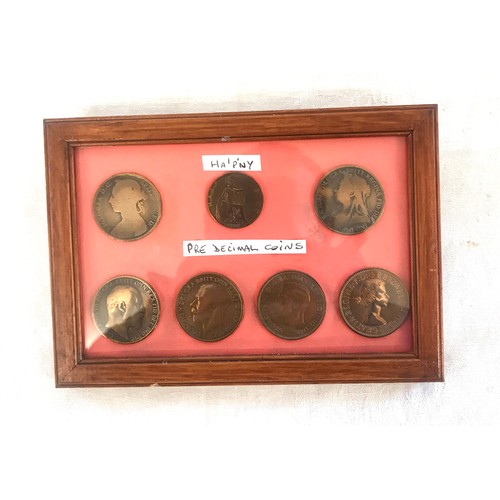 100 - Selection of framed coins includes pre decimal pennies etc