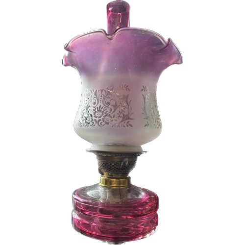 516 - Antique pink glass oil lamp, complete