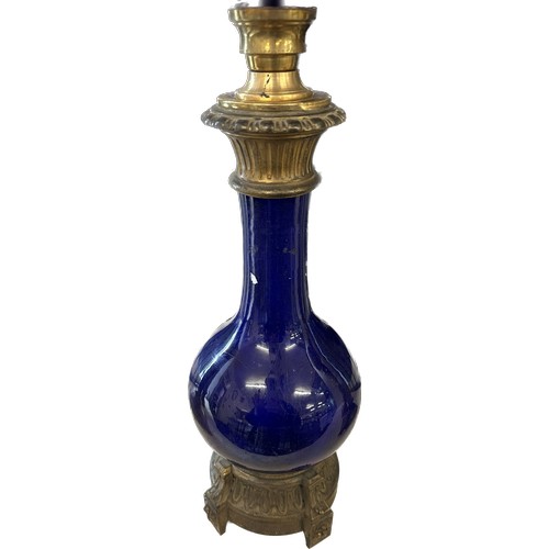 518 - Antique blue glass brass based oil lamp complete with funnel and shade