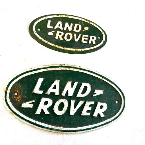 96 - 2 vintage cast iron land rover signs, largest measures approximately 10.5 x 5.5 inches