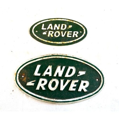 96 - 2 vintage cast iron land rover signs, largest measures approximately 10.5 x 5.5 inches