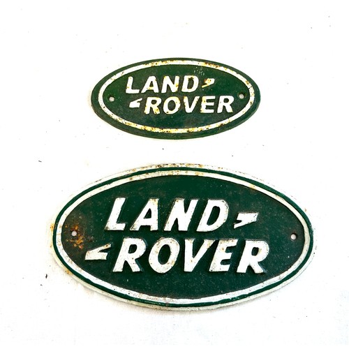 96 - 2 vintage cast iron land rover signs, largest measures approximately 10.5 x 5.5 inches