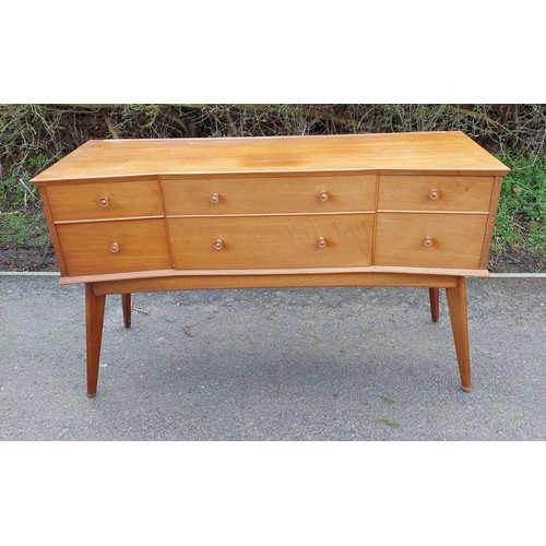 573 - 1960s teak dressing room table measures approximately 29.5 inches high by 18.5 inches deep by 47 inc... 