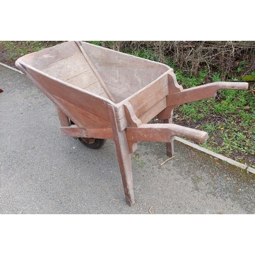 571 - Vintage large wooden wheel barrow measures approx 30 inches high