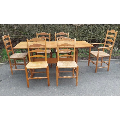 562 - Oak table and six chairs measures approx 30 inches high by 72 inches wide and 29.5 deep