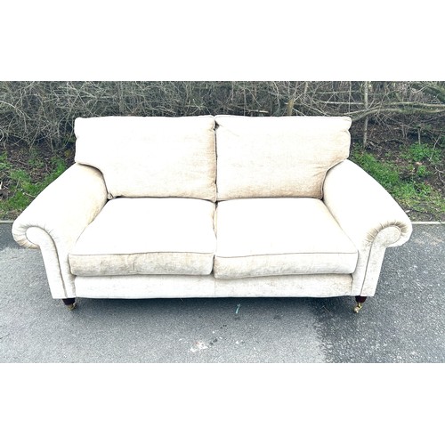 590 - Laura Ashley beige two seater with arm protectors and two cushions measures approx 73 inches wide by... 