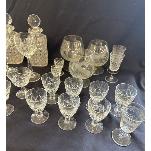 296 - Selection of glassware to include brand glasses, a pair of matching decanters etc, One decanter stop... 