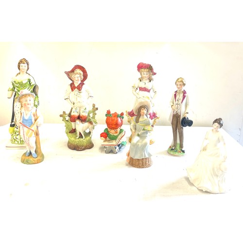 136 - a Selection of figurines to includes Royal Dux, Royal Doulton and Goebel 10 figures in total