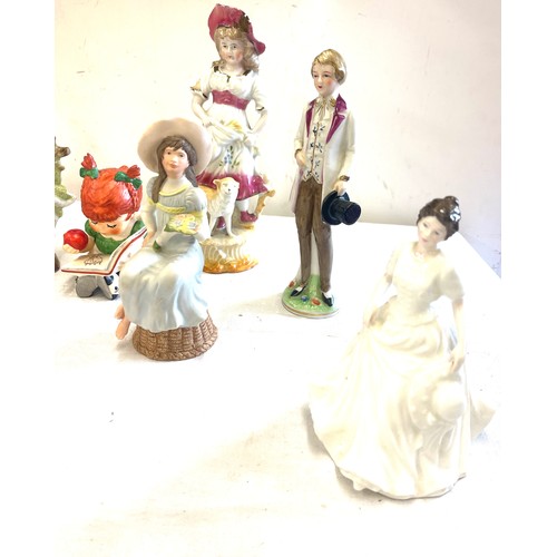 136 - a Selection of figurines to includes Royal Dux, Royal Doulton and Goebel 10 figures in total