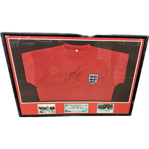 127 - Framed 1966 World cup T Shirt signed by Geoff Hurst in presentation frame, with COA, approximate fra... 