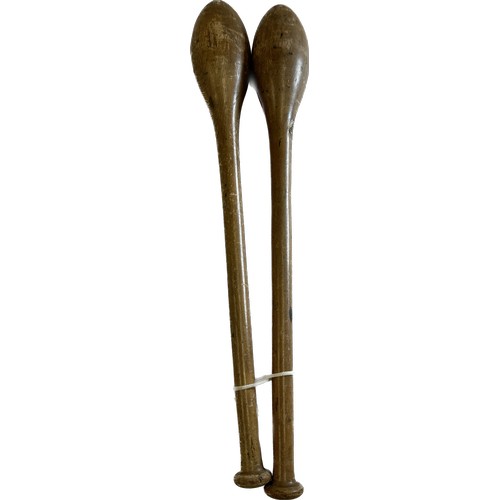 134 - Pair of possibly Indian clubs, approximate length of each 19 inches