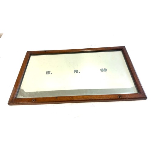 79 - Railway mirror measures approximately 16 inches by 9 inches