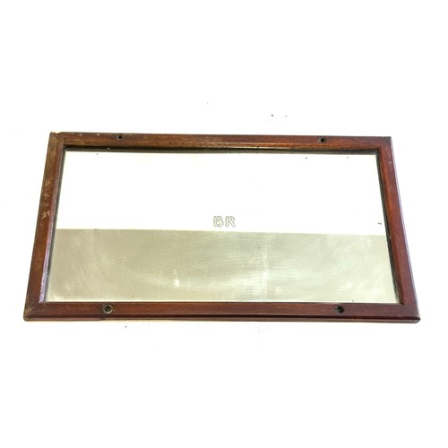 70 - Railway mirror measures approximately 16 inches by 9 inches