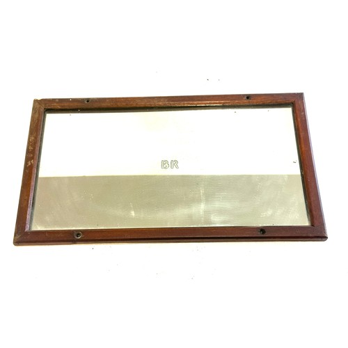 70 - Railway mirror measures approximately 16 inches by 9 inches