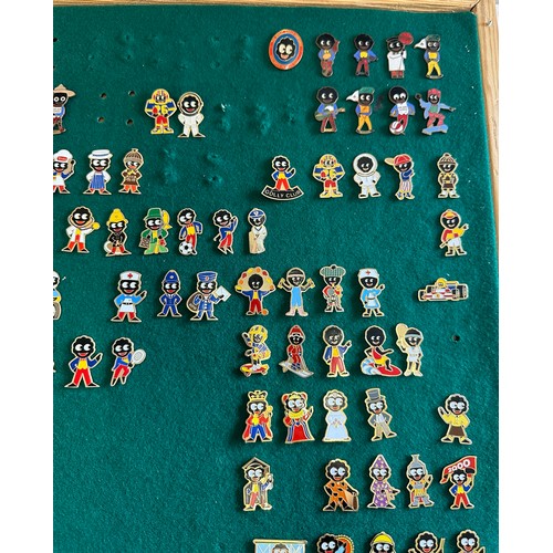 177 - Large collection of Robertsons Golly Badges, approximately 120 badges in wooden glazed frame