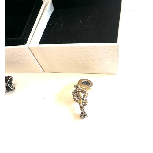 482 - 7 Boxed pandora charms includes silver charms, disney charms etc