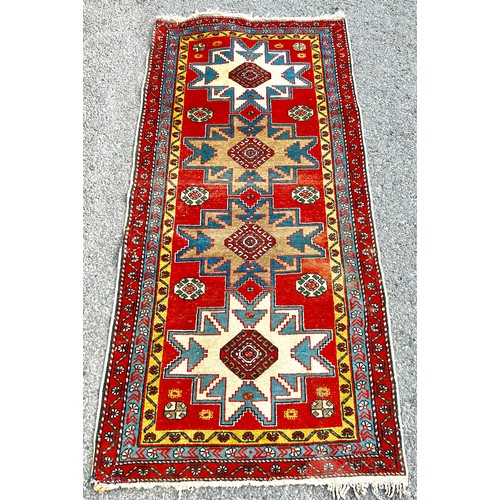 404A - Vintage lounge rug, approximate measurements: 62 x 29 inches, some sun bleaching