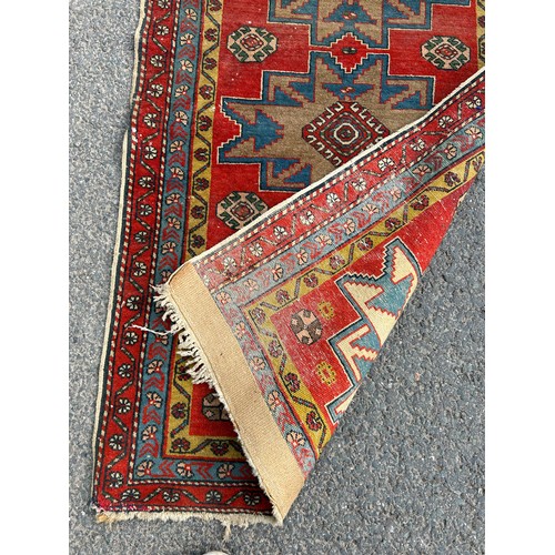 404A - Vintage lounge rug, approximate measurements: 62 x 29 inches, some sun bleaching