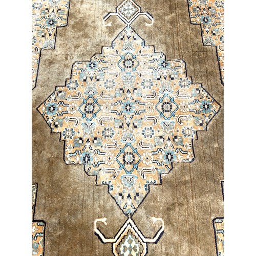 356 - Lounge rug, approximate measurements: 102 inches in length by 72 inches width