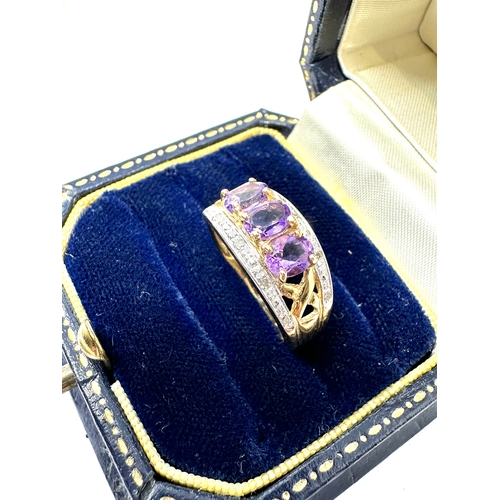 134 - 9ct gold amethyst & diamond ring weight 3.8g