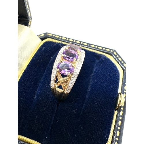 134 - 9ct gold amethyst & diamond ring weight 3.8g