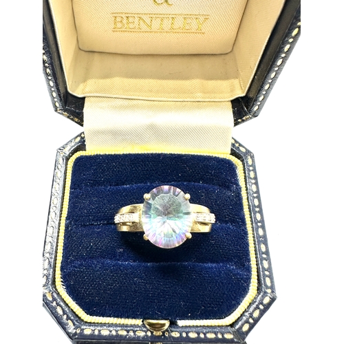 140 - 9ct gold diamond & mystic topaz ring weight 4.7g