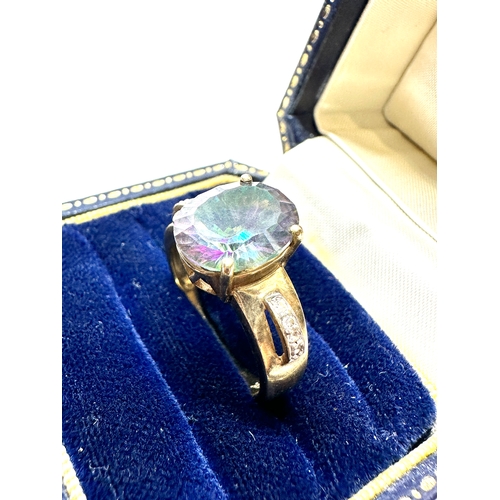 140 - 9ct gold diamond & mystic topaz ring weight 4.7g