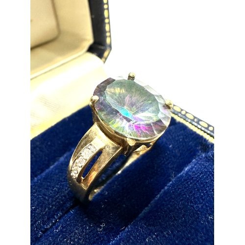 140 - 9ct gold diamond & mystic topaz ring weight 4.7g