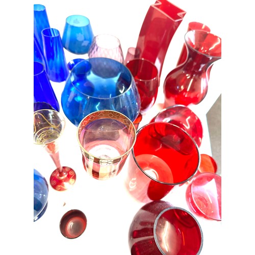 304 - Large selection of coloured glassware includes large vases etc