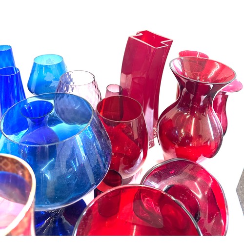 304 - Large selection of coloured glassware includes large vases etc