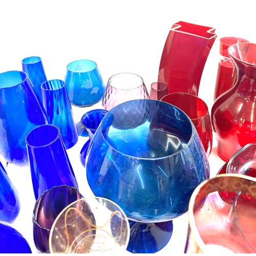 304 - Large selection of coloured glassware includes large vases etc