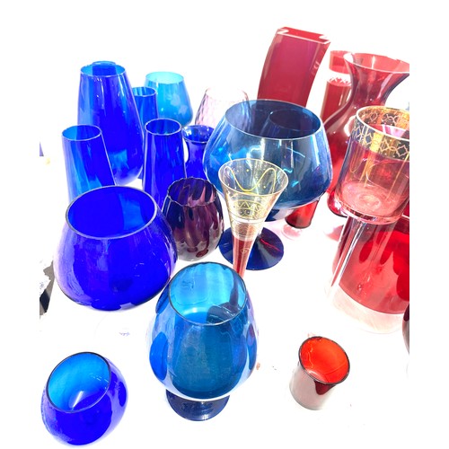 304 - Large selection of coloured glassware includes large vases etc