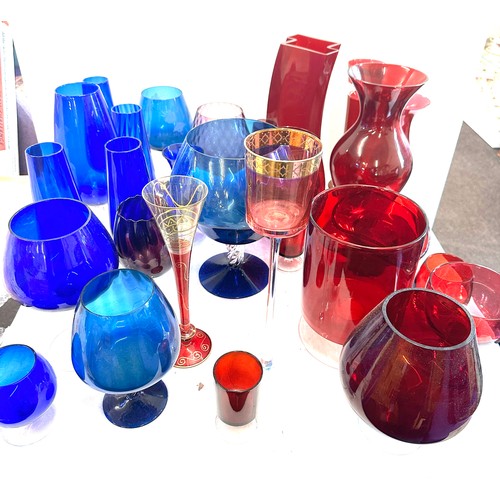 304 - Large selection of coloured glassware includes large vases etc