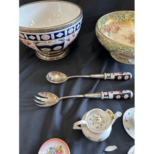 235 - Large selection of assorted pottery includes Salad bowl and salad servers etc