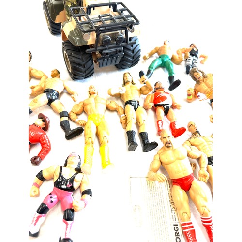 201 - Selection of figures includes action man the ultra corps quad 4x4 650cc and a selection of wrestling... 