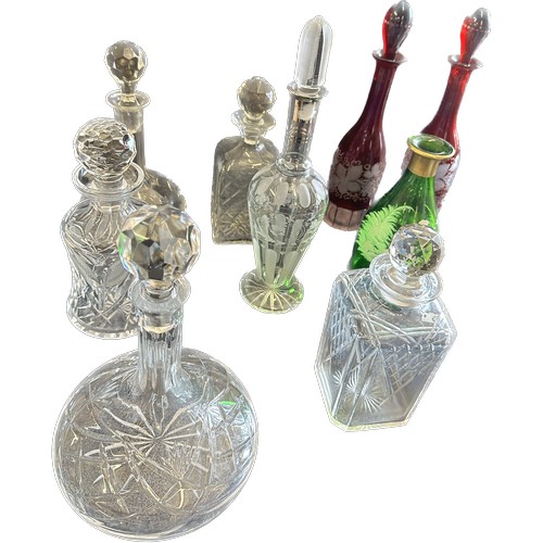 128 - 10 Cut glass decanters includes Mary Gregory etc