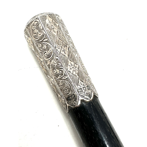 128 - Antique silver mounted & ebony baton measures approx 20ins long