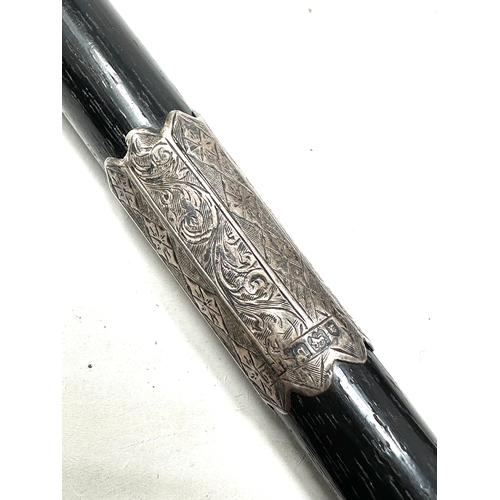 128 - Antique silver mounted & ebony baton measures approx 20ins long