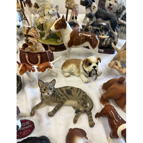 280 - Large selection of animal figures includes bull dogs, English Bull Terrior, cats, rocking horse by m... 