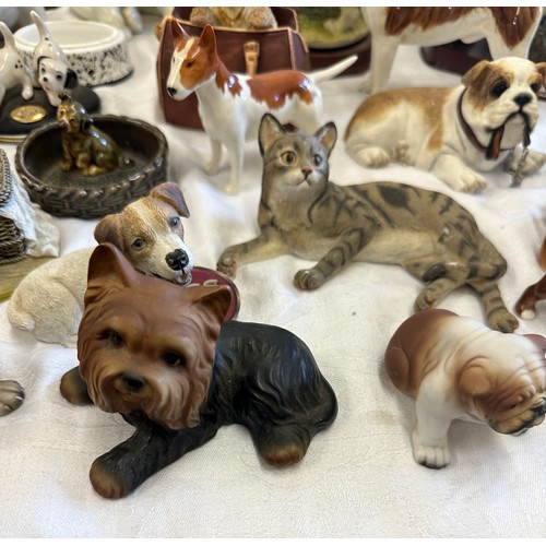 280 - Large selection of animal figures includes bull dogs, English Bull Terrior, cats, rocking horse by m... 